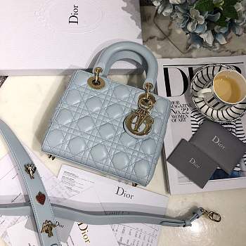 Lady Dior bag in light blue color cannage lambskin with badge &Gold hardware