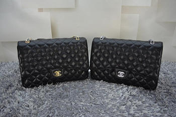 Chanel Black Caviar Leather Flap Bag With Gold / Silver Hardware Size 33cm