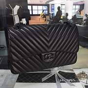 Chanel Lambskin Chevron Quilted 30cm Flap Black Bag with gun black metal - 1