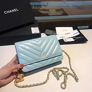 CHANEL WOC IN LIGHT BLUE WITH GOLD METAL - 1