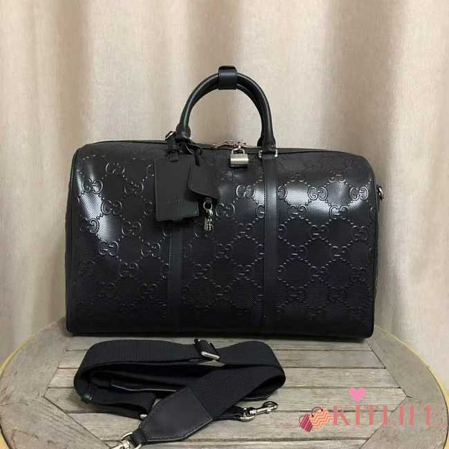 Gucci GG Embossed Leather Duffle Bag - 1