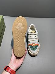 GUCCI Screener Gg Webbing-trimmed Distressed Leather And Printed Canvas Sneaker - 2