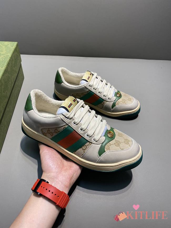 GUCCI Screener Gg Webbing-trimmed Distressed Leather And Printed Canvas Sneaker Green - 1
