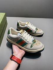 GUCCI Screener Gg Webbing-trimmed Distressed Leather And Printed Canvas Sneaker Green - 1